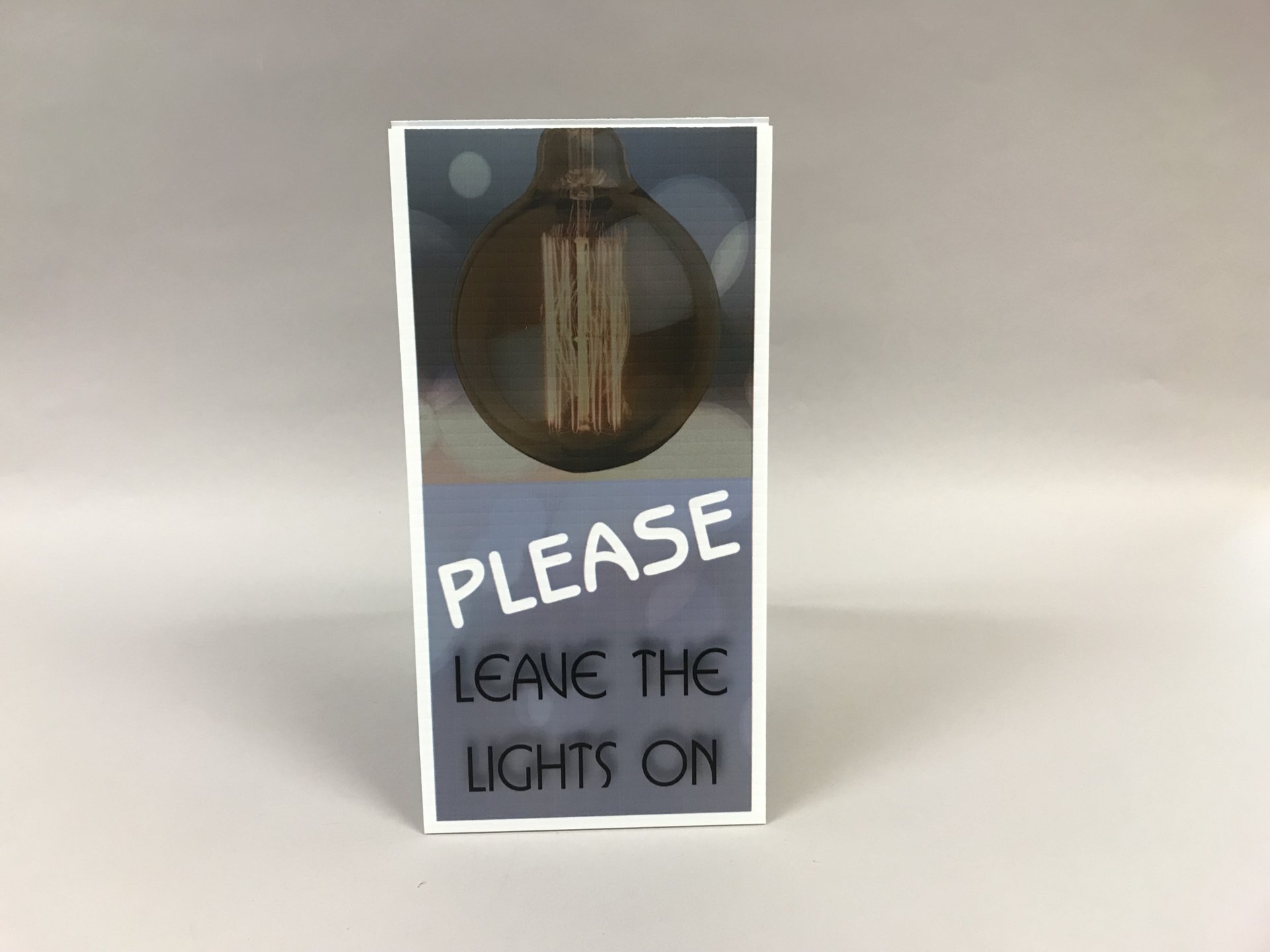 please-leave-lights-on-light-bulb-design-realty-shop